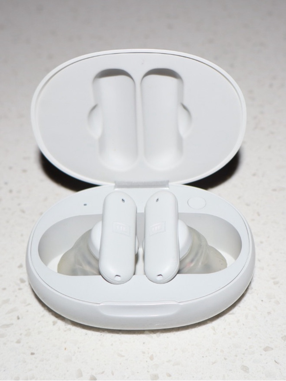 Ultimate Ears wireless ear buds and charger